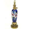 A Moorcroft Iris Pottery Vase Mounted as Lamp. Good condition. Overall measures 21-1/2" H. Shipping
