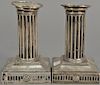 Pair of Elkington & Co. weighted sterling silver candlesticks, marked "From the Junior Subaltern to the Adjutant". ht. 5in.  