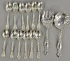 Fourteen piece sterling silver lot including two piece salad set and twelve bright cut spoons. 14.5 troy ounces