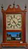 Reproduction pillar and scroll style clock. ht. 31 1/2 in., wd. 17 in.