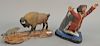 Two piece lot including Gallagher carved wood Jonah and the Whale figure (ht. 9 3/4in., lg. 12in.) and a bison in a standoff 