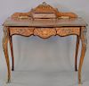 Louis XV style leather top desk with metal mounts. ht. 37 in., top: 18" x 38"