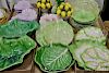 Six tray lots including Vietri leaf plates, flower plates, pair of Folha De Couve leaf bowls, cabbage leaf pitcher, lemon can