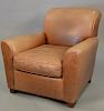 Pottery barn brown leather easy chair (sun faded).