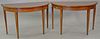 Pair of mahogany half round demilune tables. ht. 29 in., wd. 47 in.