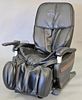 Massage chair, electric with controller.  Provenance: From the Estate of Faith K. Tiberio of Sherborn, Massachusetts