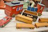Group of toys to include painted ride-on wood train (ht. 12in., lg. 18in.), small wood train, etc.   Provenance: The Estate o