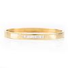 Vintage Cartier 18 Karat Yellow Gold and Square Cut Diamond Hinged Bangle Bracelet. Signed, stamped