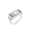 Art Deco style Approx. 1.01 Carat TW Diamond, .14 Carat Sapphire and Platinum Ring set in the Cente