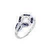 Art Deco style Approx. .96 Carat TW Diamond, .64 Carat Sapphire and Platinum Ring set in the Center