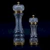Two Baccarat Style Crystal And Brass Pepper Mills. Unsigned. Wear and in need of cleaning. Measures