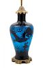 Steuben, 20TH CENTURY, a double etched dragon lamp, form no. 6094, in mirror black and celeste blue