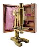 * A French Brass Microscope Height 10 1/2 inches.