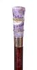 25. Amethyst Dress Cane- Ca. 1920- A well colored amethyst hardstone handle with a pair of rock crystal faceted rings, karat