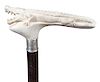 40. Stag Alligator Cane- 20th Century- A fierce alligator in full length, modern stag carving, silver metal collar, exotic
