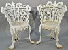 Pair of Victorian iron side chairs having floral and leaf backs with openwork seats. height 32 1/2 inches Provenance: Prop