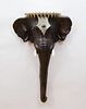 INDIAN METAL-MOUNTED CARVED AND PAINTED PLASTER ELEPHANT HEAD WALL BRACKET