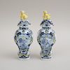 PAIR OF DUTCH POLYCHROME DELFT BALUSTER-FORM VASES AND COVERS