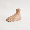 TERRACOTTA HOLLOW-CAST MODEL OF A LEFT FOOT, AFTER THE ANTIQUE