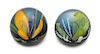 * Caithness Glass, Scotland, two glass paperweights, each with flower decoration