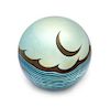 * Correia Art Glass, Fountain Valley, California, a moon and waves iridescent surface-design paperweight