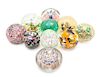 * A Group of Ten Large Glass Paperweights/Doorstops Diameter of largest 5 3/4 inches