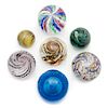 * A Collection of Glass Paperweights Diameter of largest 3 inches