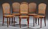 Set of Six French Louis XV Style Carved Oak Dining Chairs, 20th c., the arched caned backs to bowed caned seats on turned tap