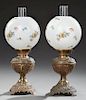 Pair of Brass Gone with the Wind Oil Lamps, late 19th c., with floral painted ball shades and glass chimneys, now electrified