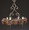 Unusual French Provincial Louis XVI Style Carved Walnut and Wrought Iron Four Light Chandelier, 20th c., with a scrolled iron