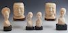 Group of Six African Carved Ivory Figures, mid 20th c., consisting of four female busts, and a male and a female head, each m