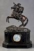 French Patinated Bronze and Black Marble Figural Mantle Clock, 19th c., by Samuel Marti, the top with a large bronze figure o