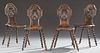 Set of Four French Louis XIII Style Carved Oak Side Chairs, 19th c., the arched pierced scroll and leaf carved medallion back