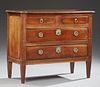 French Louis XVI Style Carved Walnut Commode, 19th c., the stepped edge top over two frieze drawers above two long drawers, f