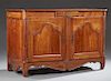 French Provincial Louis XV Style Carved Cherry Sideboard, early 19th c., the rounded corner top over a central frieze drawer 
