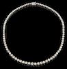 Platinum Tennis Necklace, each of the 93 links with a graduated round diamond, total diamond weight- 16.37 cts., L.- 17 in., 