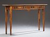 English Style Carved Mahogany Console Table, 20th c., the rectangular banded inlaid top over banded double frieze drawers, on