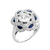 Art Deco style Diamond, Sapphire and Platinum Ring set in the Center with .66 Carat Round Brilliant