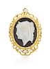 A Victorian Yellow Gold and Onyx Cameo Brooch/Pendant, 15.40 dwts.