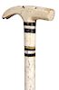 22. Nautical Hammer Whalebone Cane- Mid 19th Century- A whale bone carved hammer handle, 4 baleen collar rings, a 5/8” whalebone shaft and never had a