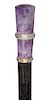 65. Amethyst Dress Cane- Ca. 1890- A decorative amethyst handle with rock crystal faceted rings, ebony shaft and a brass ferrule. H.- 2 ½” x 1” O.L.- 