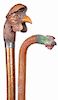 120. Rooster Folk Art Canes- Late 19th Century- A pair of folk-art painted and carved rooster canes, one with a hallmarked British collar and the othe