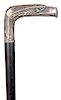 126. Silver Eagle Dress Cane- Early 20th Century- A stylized .800 silver eagle handle with a registration mark of “#8692 KHN”, the thumb rest on the n