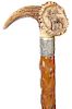 148. Stag Folk Cane- Ca. 1890- large carved antler with a buck and tree high relief carved on the button, original patina in nice condition, ornate si