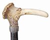 151. Anti-Semitic Stag Cane- early 20th century-  nicely carved antler, woven silver collar, ebonized shaft and a metal ferrule. H.- 4” x 2 ½” O.L. 34