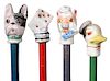 188. Collection of Carnival Canes- Four porcelain carnival canes with original painted shafts in fine condition including the hard to find “Rogue Dona