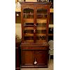Antique Victorian Mahogany Bookcase. Two large glass display doors with gothic arches at the top, large fitted center drawer above two doors, key incl
