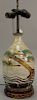 Asian earthenware glazed bottle having green blue enameled caterpillar with anchor and wavy decorated base with overall white wash g...