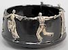 Black onyx stone bowl with six silver dancing figures holding hands. height 3 3/4 inches, diameter 7 inches.   Provenance: Estat...