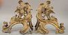 Pair of Louis XV style chenets, each mounted with winged dragon. height 15 inches, width 15 inches.   Provenance: Estate of Pegg...